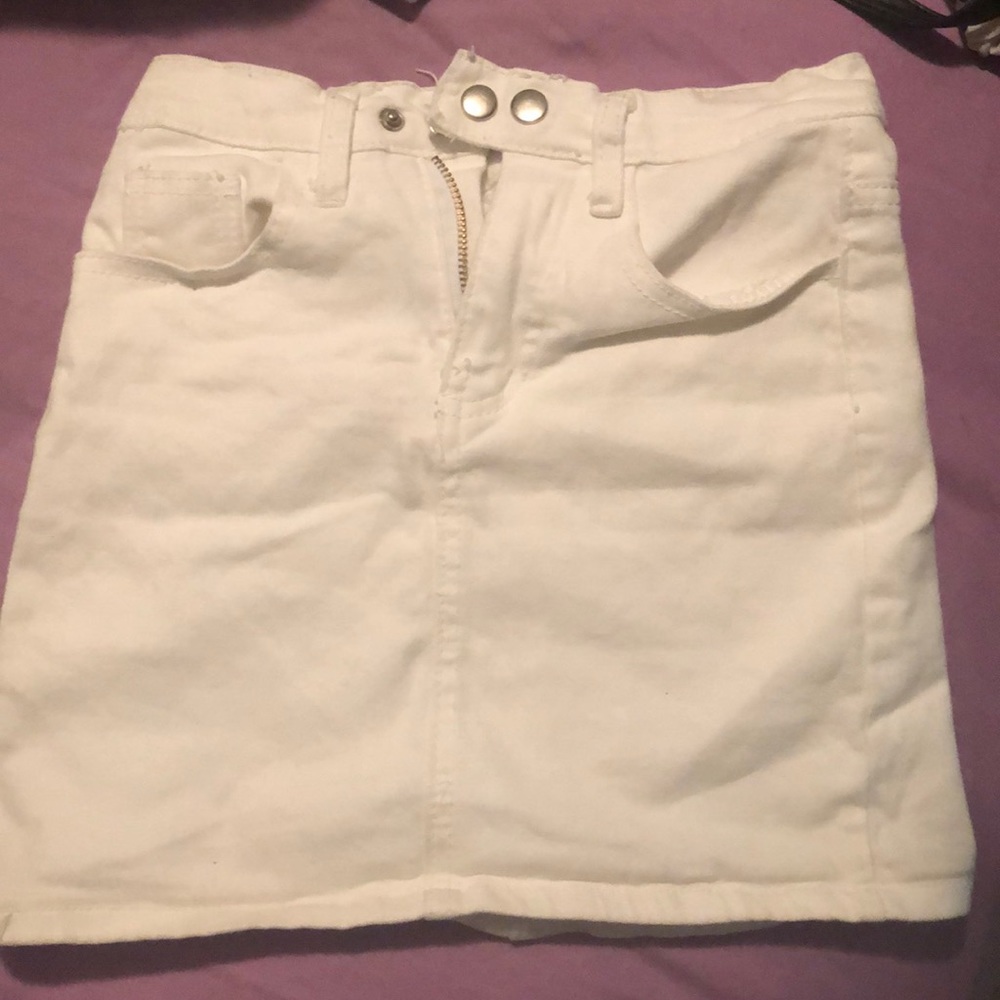 A white denim mini skirt